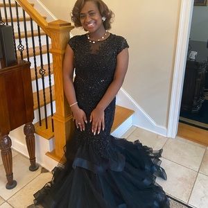 Black, beaded, prom dress. Mermaid shape with a tool bottom.